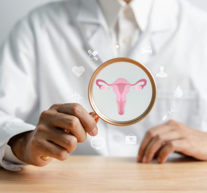 doctor in a white coat holding virtual uterus reproductive system , woman health, PCOS, ovary gynecologic and cervix cancer, Healthy feminine concept